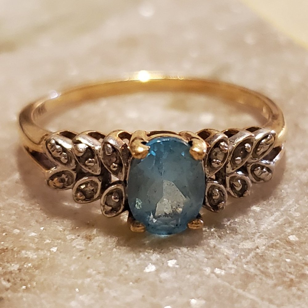 Blue Topaz and Diamond Oval Cut Ring